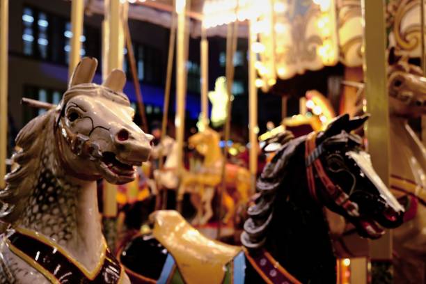 istock Closeup of an empty merry-go-round against a blurred background 1459573898