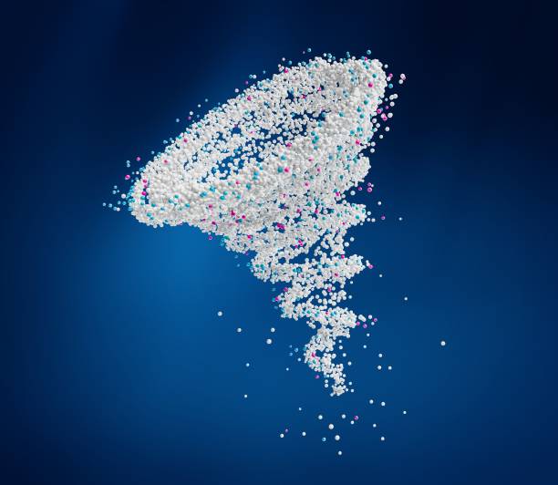 istock Twisted powder of detergent grain flow and cyclone special effect stain remover on blue background 1459574024