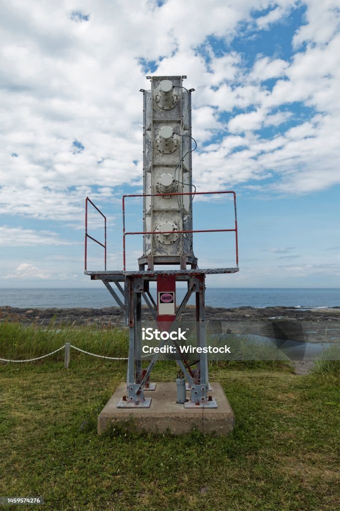 A foghorn for marine safety A stack of foghorn on a concrete based. Used as a warning for ships on a foggy day. Architecture Stock Photo