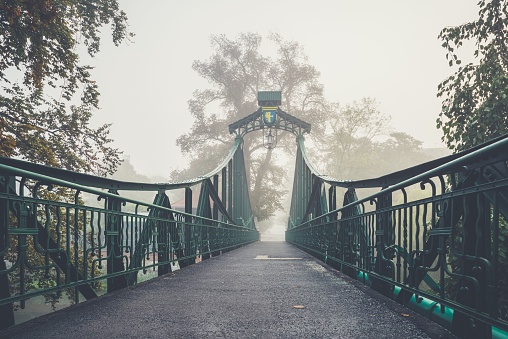 A scenic shot of the Groszowy Bridge in Opole (Poland) on a foggy day