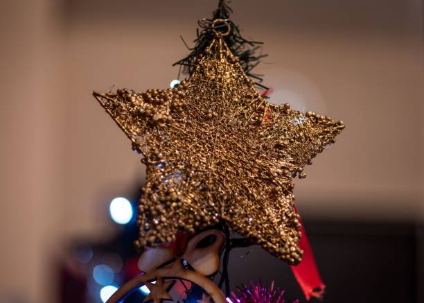 istock Group of various Christmas toys on the tree on a blurred background 1459579718