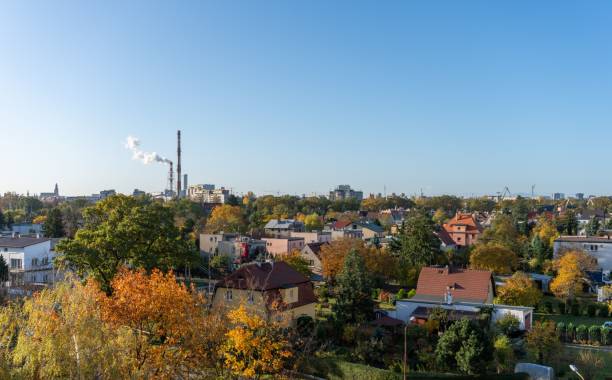 istock Beautiful view of buildings rooftops under a blue sky 1459579802
