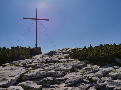 A cross in Karst plateau in the Dachstein group near lake Hallstatt in Salzkammergut, Austria