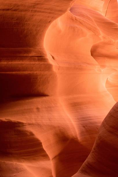 istock Vertical shot of a red cave illuminated by bright sunlight 1459580910