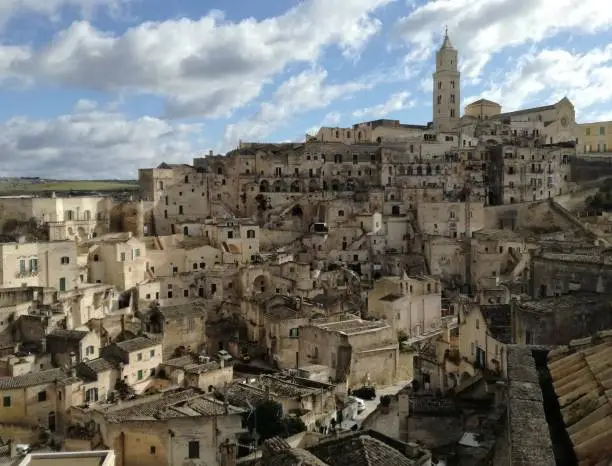 The Sassi di Matera are two districts (Sasso Caveoso and Sasso Barisano) of the Italian city of Matera, Basilicata, well-known for their ancient cave dwellings inhabited since the Paleolithic period.