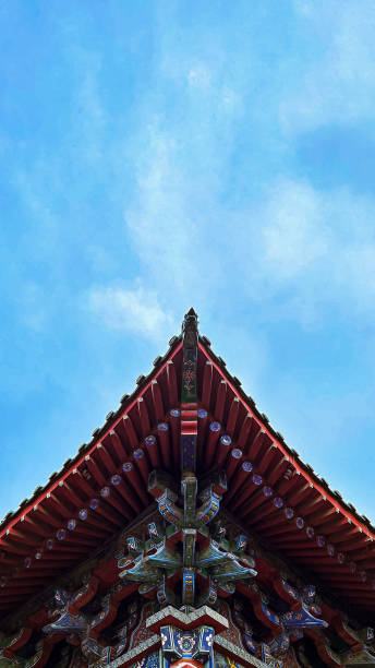 istock Low angle of an old wood architecture under a wispy sky 1459584100