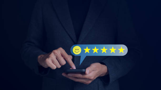 istock User give a rating five star to service experience on smartphone app. and evaluate the quality of service to reputation ranking of the business. Customer satisfaction feedback review survey concept. 1459584959