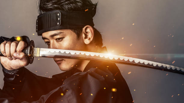istock Japanese samurai holding katana. Historical drama. 1459585259