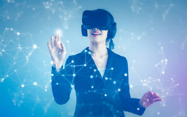 istock Asian businesswoman with VR headset exploring virtual reality screen. Business, technology, internet iot and networking concept. 1459588447