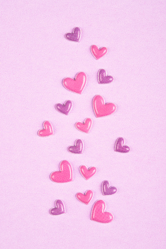 Hearts on pink background