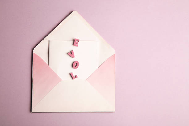 istock Envelope with paper card , and word love 1459589438