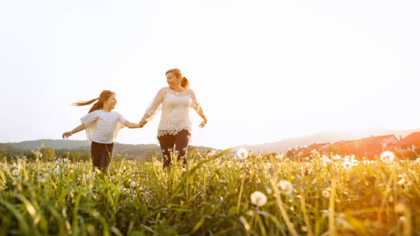 istock Mother playing with her daughter 1459591658