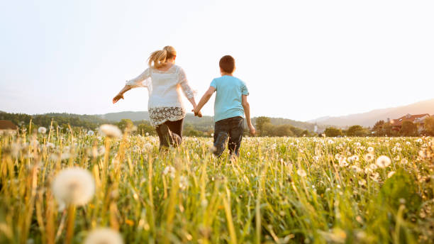 istock Grandson playing with his grandmother 1459591673