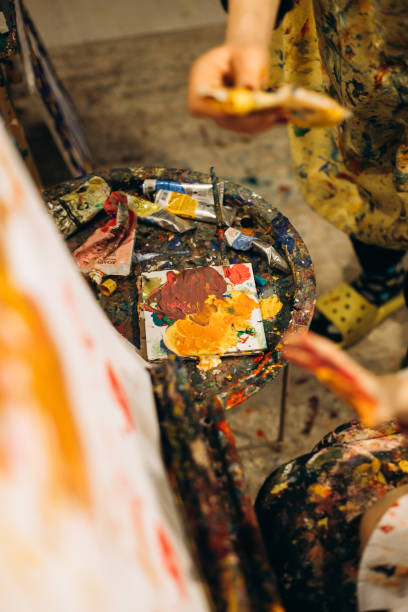 istock A palette with colorful paints on it in a creative workshop 1459592806