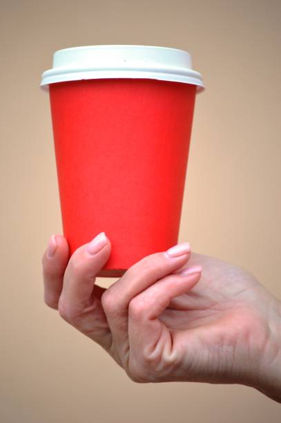 istock girl holding a glass 1459593879