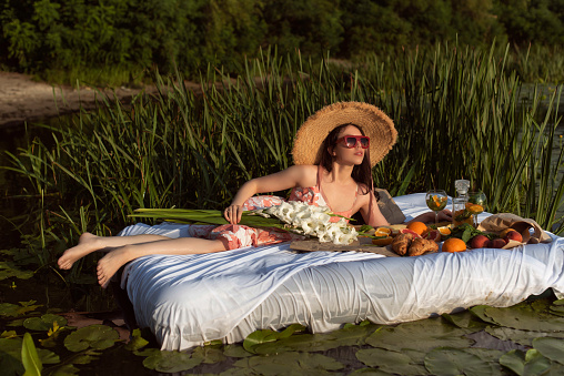 Picnic with a girl on the water