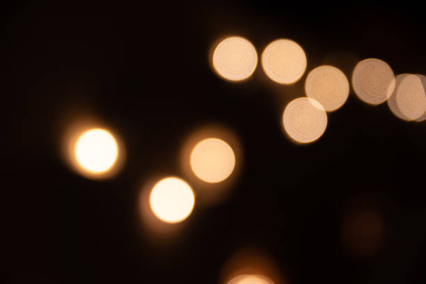 bokeh da bola da cor quente - warm light - fotografias e filmes do acervo