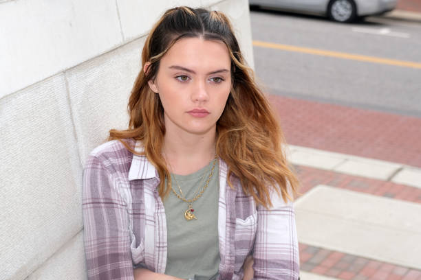 istock Teenaged girl with sad expression 1459600544