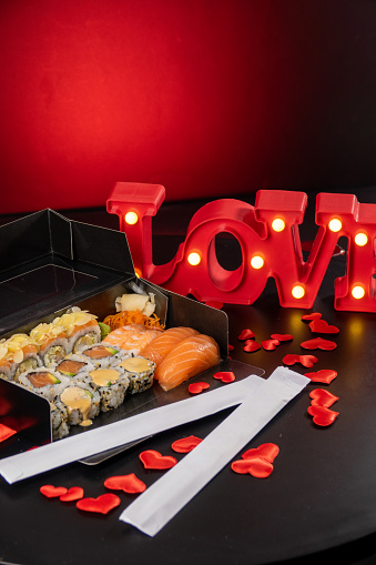 Valentine's day sushi with sushi box, written love and hearts