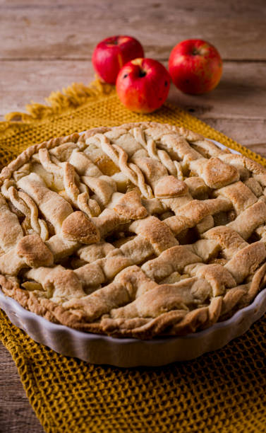 istock Homemade apple pie on wooden background 1459605144
