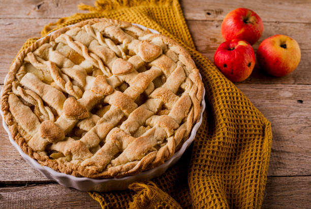 istock Homemade apple pie on wooden background 1459605240