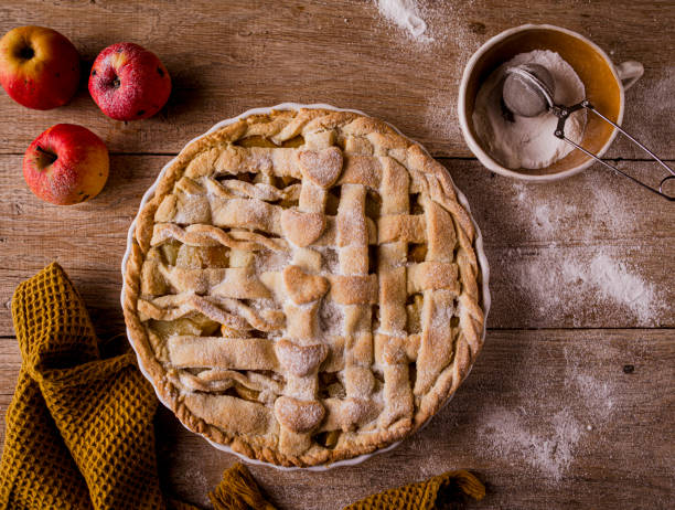 Homemade apple pie on wooden background
