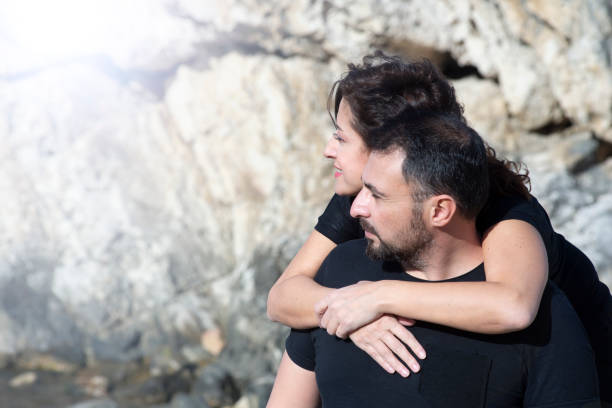 Happy couple on the sea shore