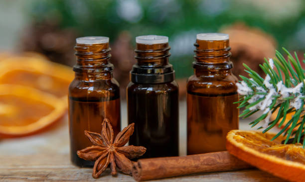 istock Christmas essential oils in small bottles. Selective focus. 1459606901