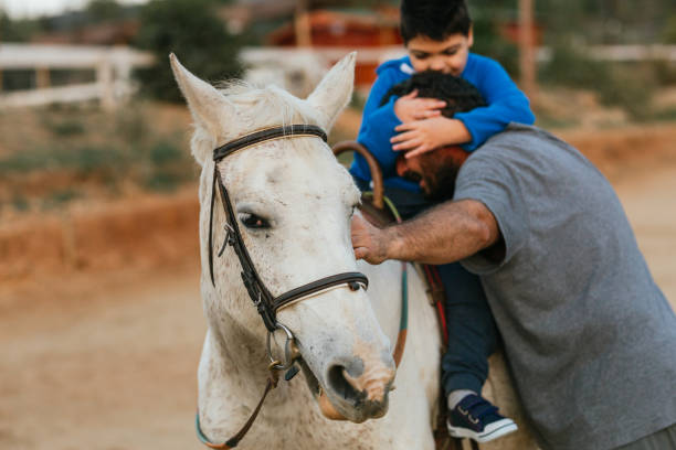 istock child with disability thankful to his physiotherapist during a therapy session 1459608329
