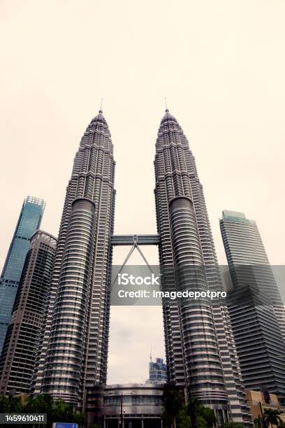 Dramatic Petronas Towers View In Kuala Lumpur City Stock Photo - Download Image Now - Admiration, Adventure, Apartment