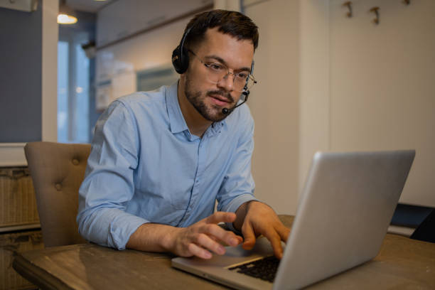 istock Young fashionable man working at home 1459616568