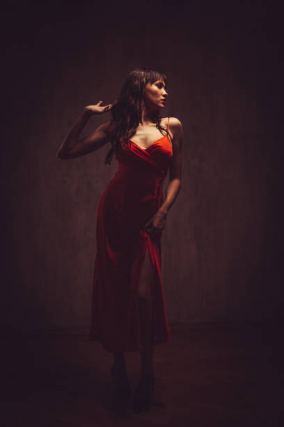 istock Young Woman In A Red Dress 1459620143