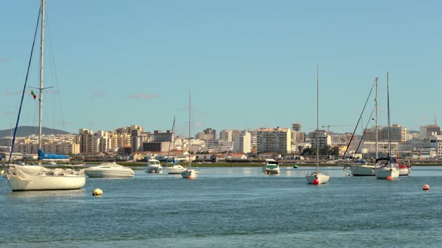 Beautiful sea view of the Ria Formosa park of Faro. view of yachts and multi-storey houses