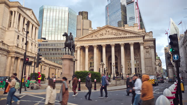 Time lapse of Crowded people and traffic at Social Stock Exchange and Bank of England around Bank Station in downtown district of London, United Kingdom