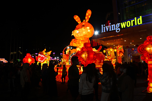 Tangerang, Indonesia - January 21, 2023 : Chinese traditional Easter bunny lanterns lit up at night. Chinese New Year and lantern festival at Living World mall