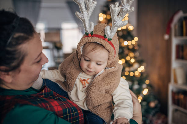 istock Mother holding her baby 1459642680