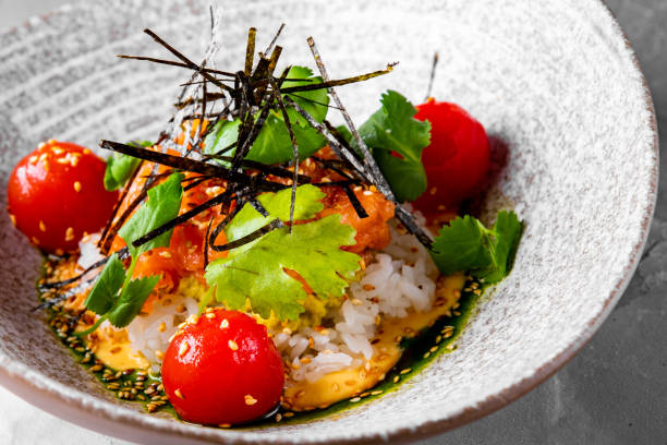 istock salmon poke with rice and vegetables in bowl 1459662107