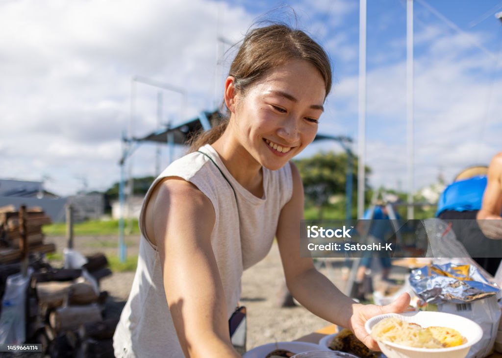 Female trapeze artists having barbecue after the lesson Circus Stock Photo