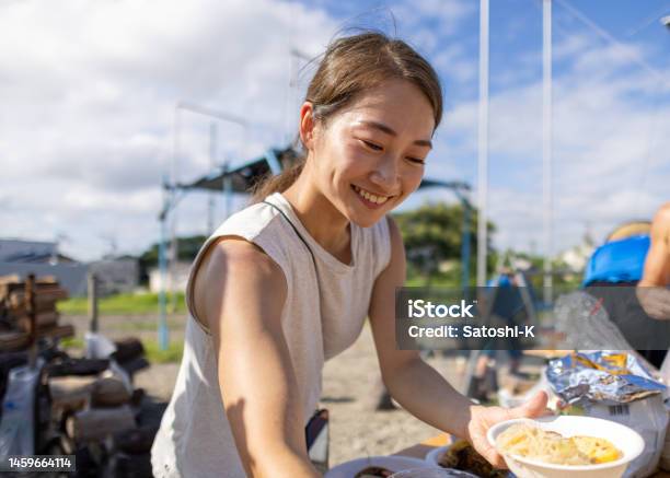 Female Trapeze Artists Having Barbecue After The Lesson Stock Photo - Download Image Now