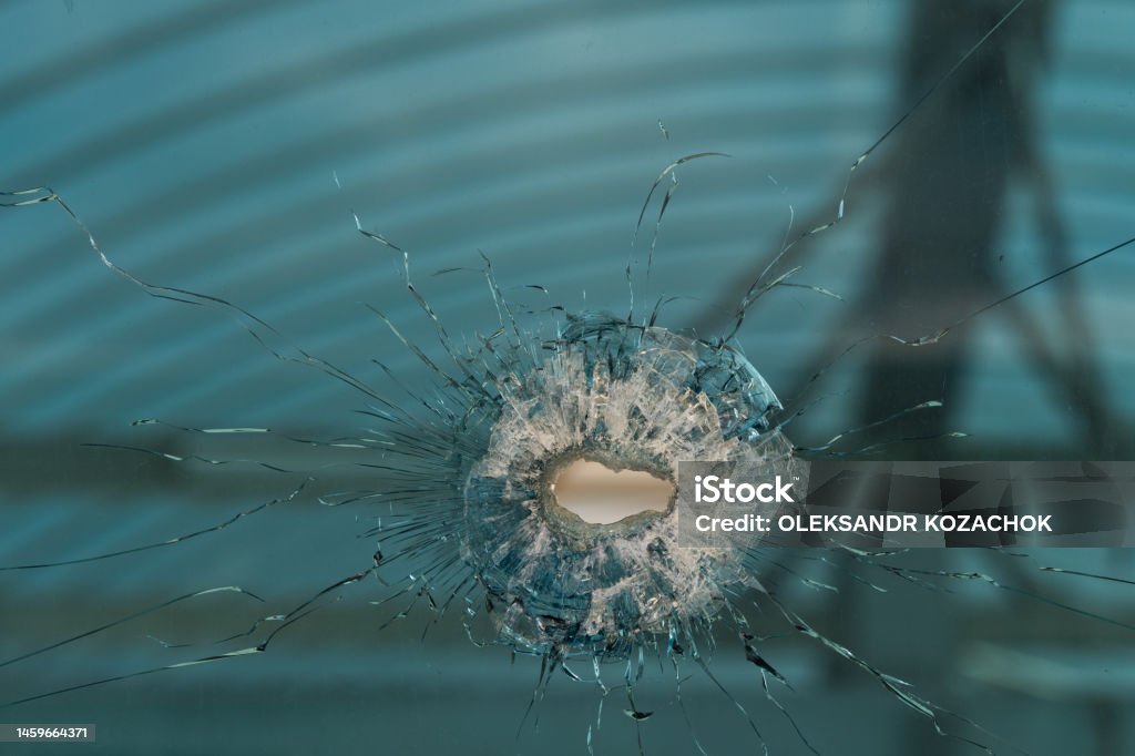 Bullet Hole In Glass Authentic Shot Closeup Isolated On White Stock