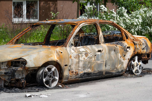 istock Burnt out car crash after fire. Close-up. 1459664846
