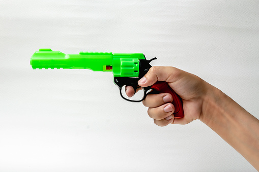 Colorful toy guns for children aged 10 and up.