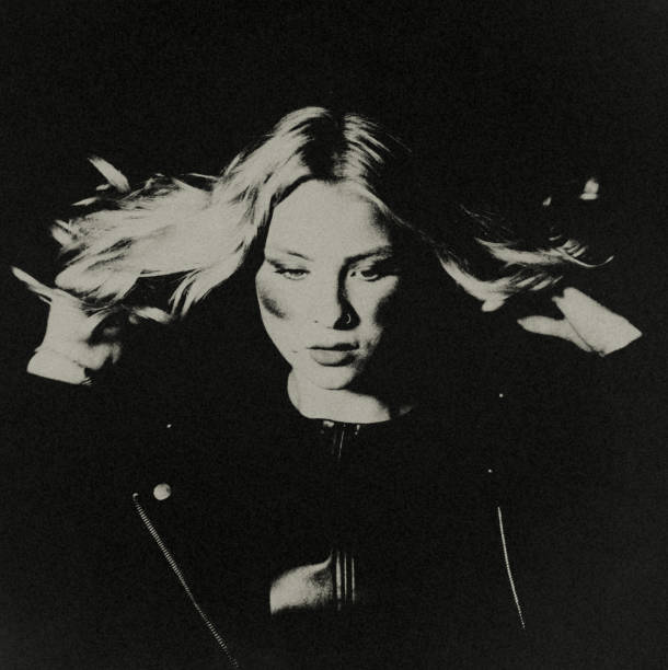istock The modern young woman in the dark. 1459673910