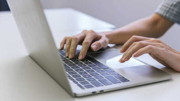 istock Woman hand using laptop or computor searching for information in internet online society web. Searching information data on internet networking concept. Data Search Search Engine Optimization. 1459674678