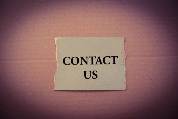 istock Contact Us word written on torn paper 1459675631
