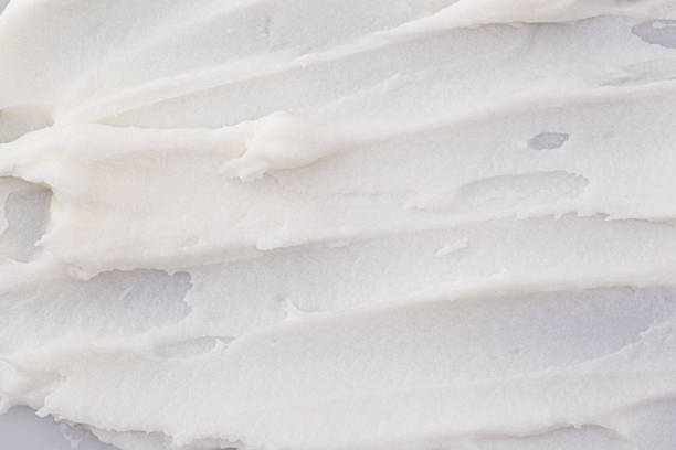istock white texture of cosmetic cream background 1459676802