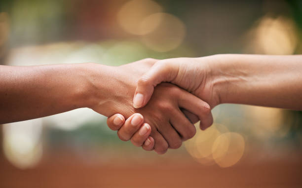 istock Handshake, closeup and partnership for contract, agreement and teamwork. Trust, support and shaking hands for b2b communication, collaboration and thank you for cooperation, well done and solidarity. 1459683305