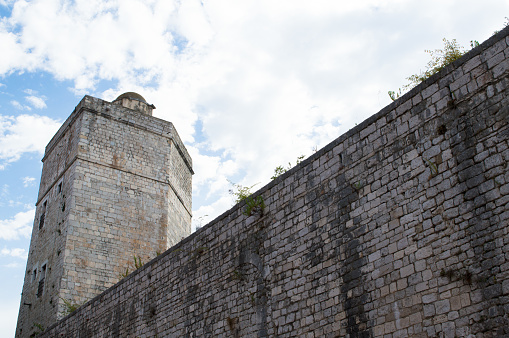 Medieval stone walls and Captain tower in pentagonal shape, build by Venetians in Zadar, Croatia
