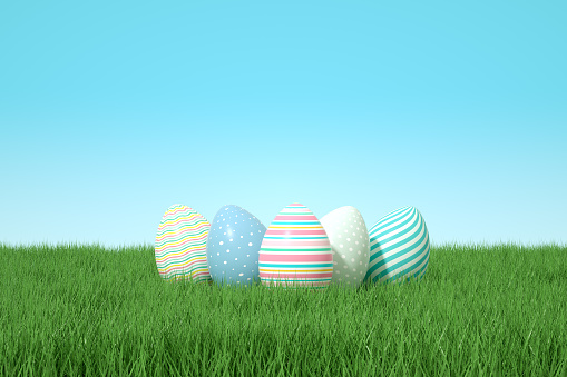 Easter eggs on grass, 3d render.