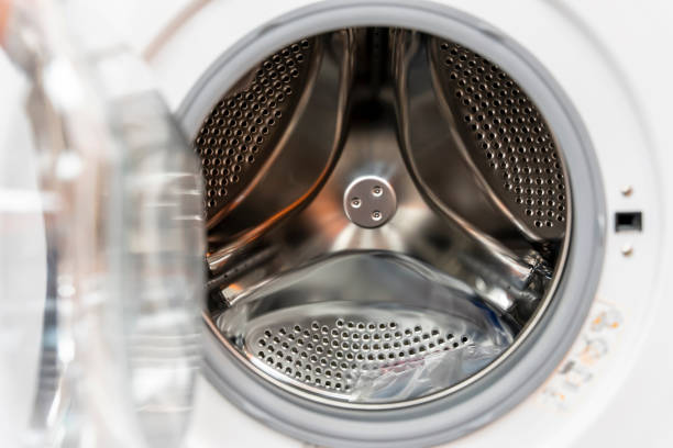 close-up of the metal drum of a modern washing machine stock photo